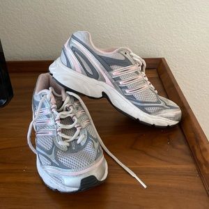 Adidas Torsion System walking shoe.